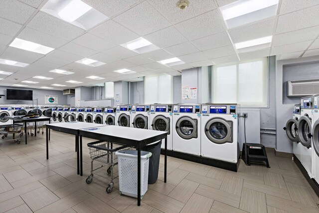 100 Manhattan Ave Unit 1517, Union City, NJ 07087 - community laundry room featuring washer and clothes dryer