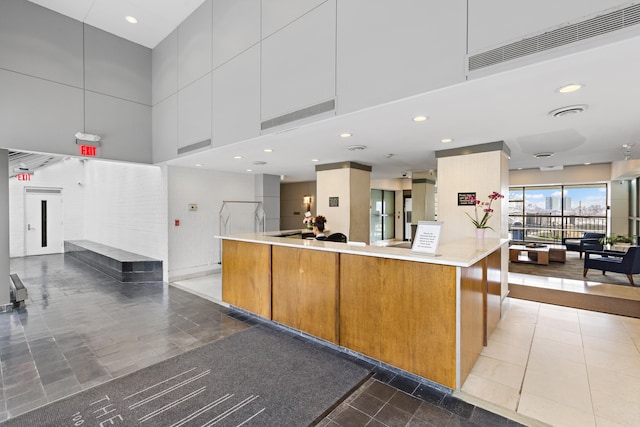 100 Manhattan Ave Unit 1517, Union City, NJ 07087 - reception area featuring a towering ceiling and recessed lighting