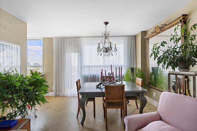 dining space with a chandelier