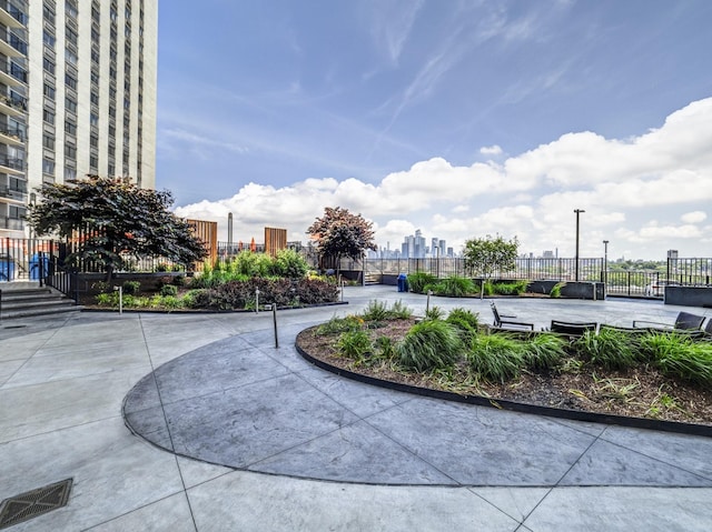 surrounding community featuring fence