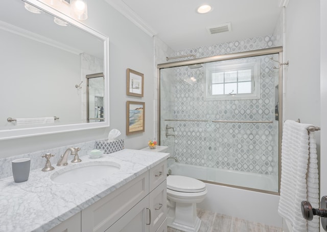 26 Bridge St, Bay Head Borough, NJ 08742 - bathroom featuring vanity, shower / bath combination with glass door, toilet, ornamental molding, and wood finished floors