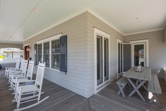 26 Bridge St, Bay Head Borough, NJ 08742 - wooden porch with outdoor dining space