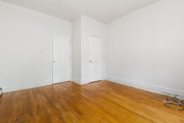 268 Bergen Ave, Jersey City, NJ 07305 - empty room with wood-type flooring and baseboards