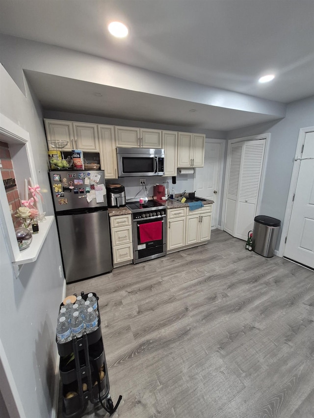 1200 Central Ave Unit B2, Union City, NJ 07087 - kitchen with appliances with stainless steel finishes, recessed lighting, and light wood finished floors