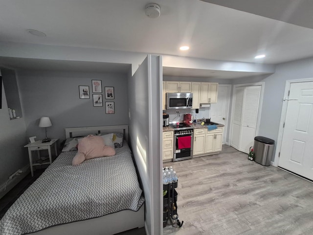 1200 Central Ave Unit B2, Union City, NJ 07087 - bedroom featuring light wood-type flooring and recessed lighting