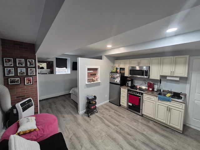 1200 Central Ave Unit B2, Union City, NJ 07087 - kitchen featuring stainless steel appliances, light wood-style floors, and recessed lighting