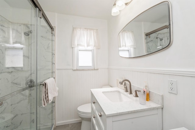 104 W 52nd St, Bayonne, NJ 07002 - bathroom featuring wainscoting, a marble finish shower, vanity, and toilet