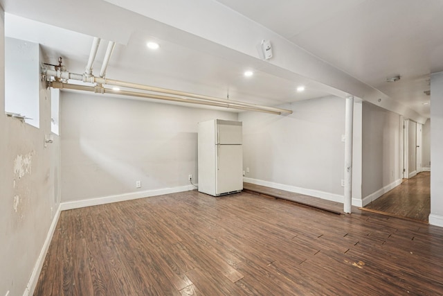 6607 Kennedy Blvd, North Bergen, NJ 07047 - finished basement featuring freestanding refrigerator, wood finished floors, and recessed lighting