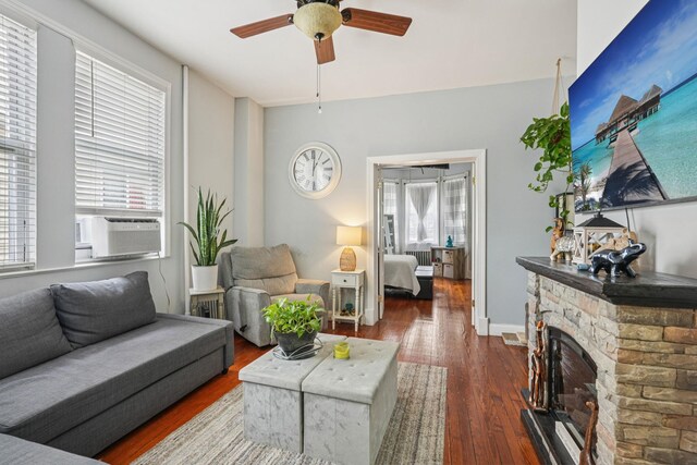 6607 Kennedy Blvd, North Bergen, NJ 07047 - living area featuring cooling unit, ceiling fan, hardwood / wood-style flooring, and healthy amount of natural light