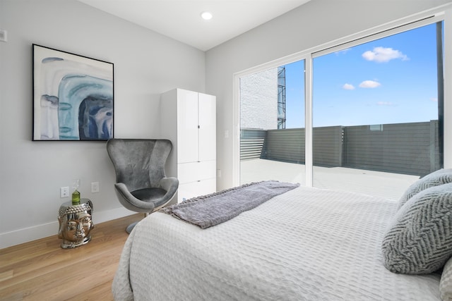 bedroom featuring hardwood / wood-style flooring