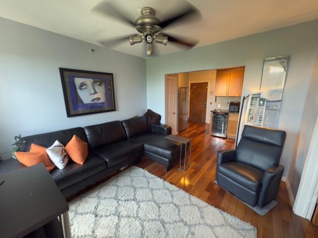 108 Waldo Ave Unit 4A, Jersey City, NJ 07306 - living room featuring wood finished floors and a ceiling fan