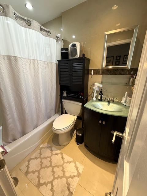108 Waldo Ave Unit 4A, Jersey City, NJ 07306 - full bath with shower / bath combination with curtain, vanity, and tile patterned flooring