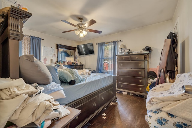 bedroom featuring dark wood-style floors and ceiling fan