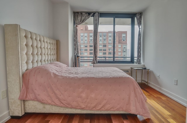 389 Washington St Unit 30C, Jersey City, NJ 07302 - bedroom with wood finished floors