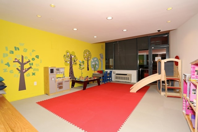 389 Washington St Unit 30C, Jersey City, NJ 07302 - playroom with recessed lighting and finished concrete floors