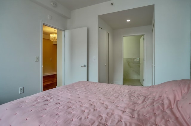 389 Washington St Unit 30C, Jersey City, NJ 07302 - bedroom with a chandelier