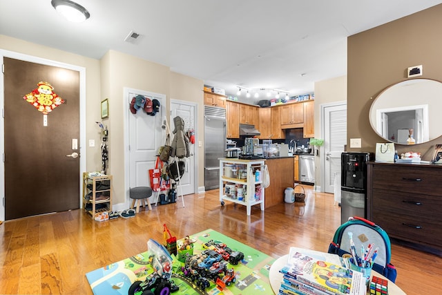 20 Avenue At Port Imperial Unit 418, West New York, NJ 07093 - living area with light wood-style flooring and track lighting