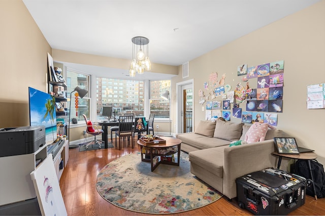 20 Avenue At Port Imperial Unit 418, West New York, NJ 07093 - living room featuring plenty of natural light, wood finished floors, and a chandelier