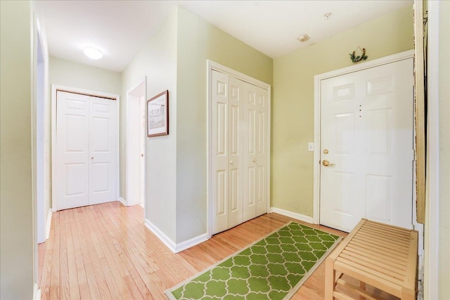 252 The Promenade Unit 252, Edgewater, NJ 07020 - foyer entrance with light wood-type flooring and baseboards