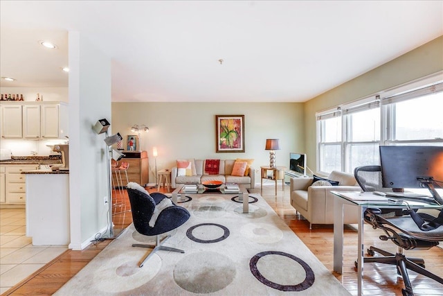 252 The Promenade Unit 252, Edgewater, NJ 07020 - living area with light wood-type flooring, an office area, and recessed lighting