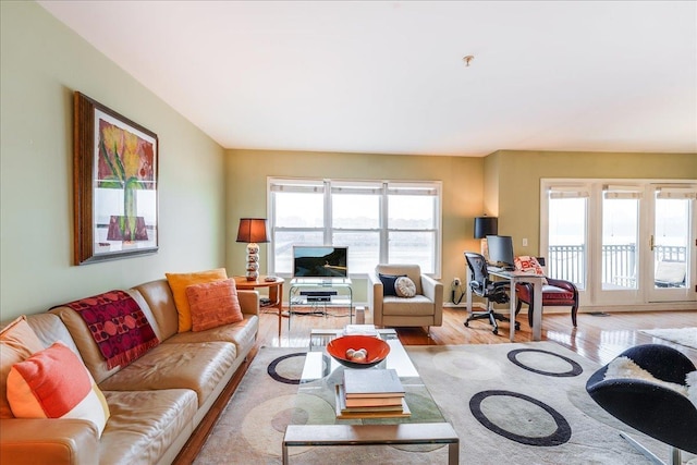252 The Promenade Unit 252, Edgewater, NJ 07020 - living area with light wood-style floors