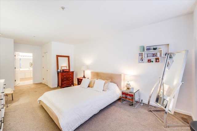 252 The Promenade Unit 252, Edgewater, NJ 07020 - bedroom with light carpet and ensuite bathroom