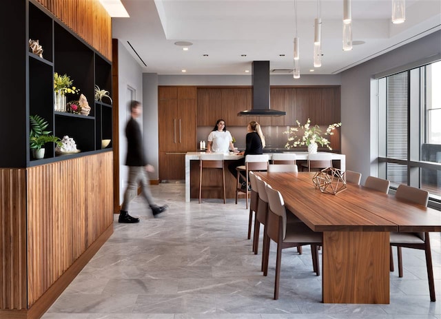 dining room featuring recessed lighting