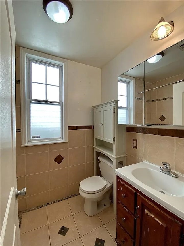 152 Highland Ave Unit 2B, Jersey City, NJ 07306 - bathroom featuring tile walls, vanity, and tile patterned flooring
