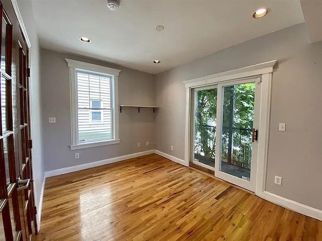 152 Highland Ave Unit 2B, Jersey City, NJ 07306 - unfurnished room featuring light wood finished floors, recessed lighting, and a smoke detector