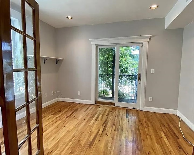 152 Highland Ave Unit 2B, Jersey City, NJ 07306 - unfurnished room with light wood-style floors and recessed lighting