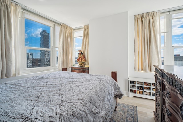 bedroom featuring wood finished floors