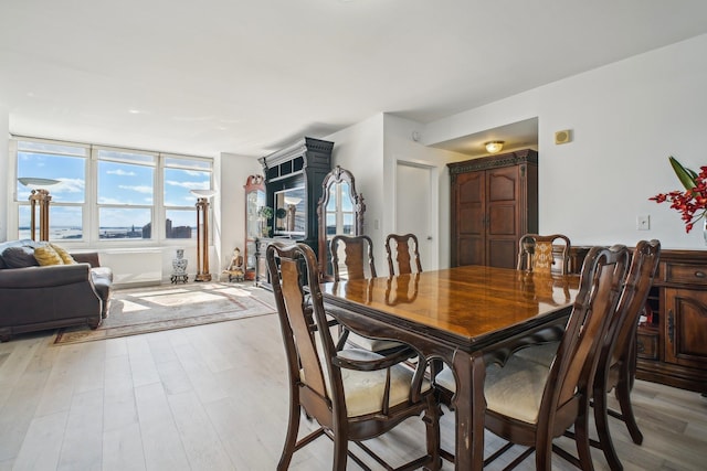 dining room featuring light wood-type flooring