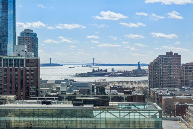 property's view of city with a water view