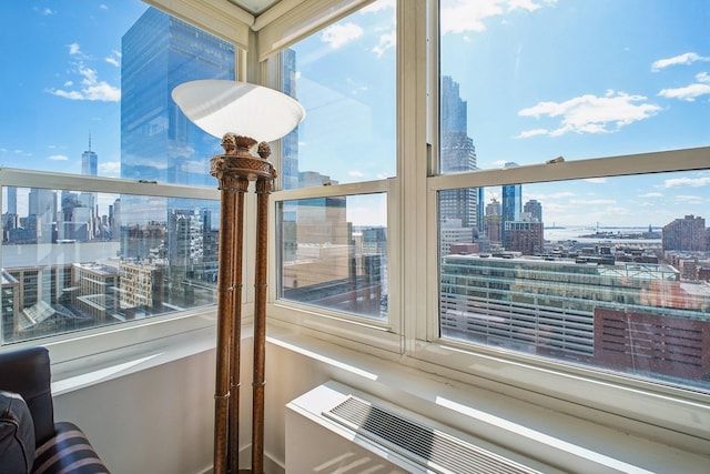 room details with a view of city and radiator heating unit