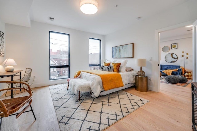 bedroom featuring light hardwood / wood-style floors