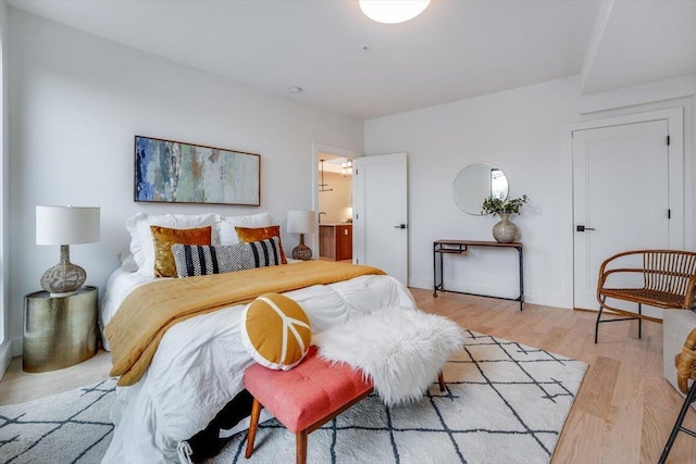 bedroom featuring light wood-type flooring