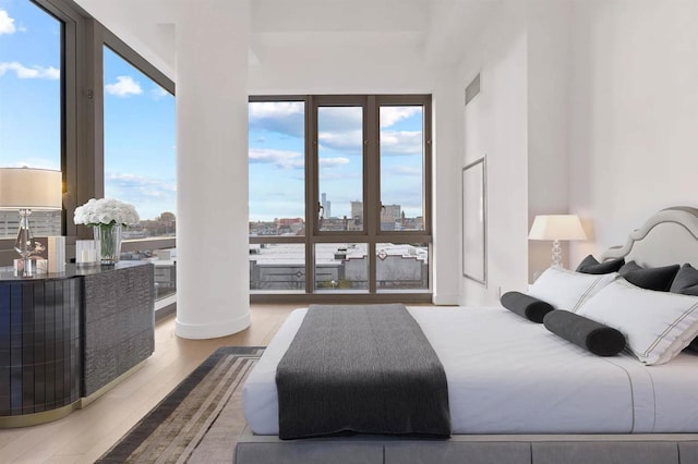 bedroom featuring wood-type flooring