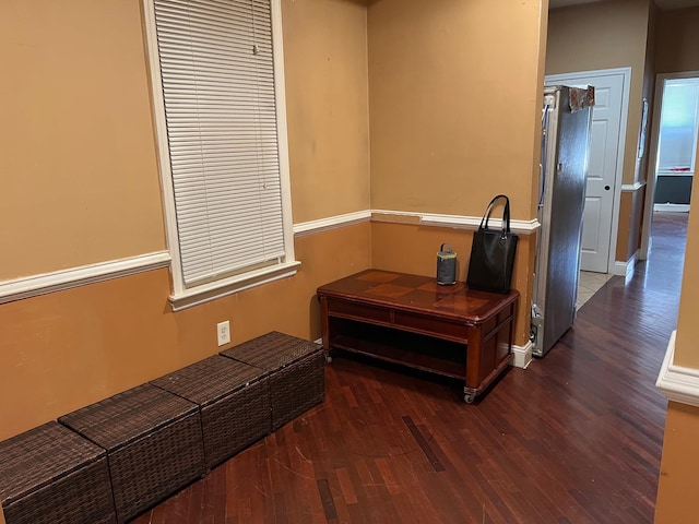 hall featuring dark wood-type flooring