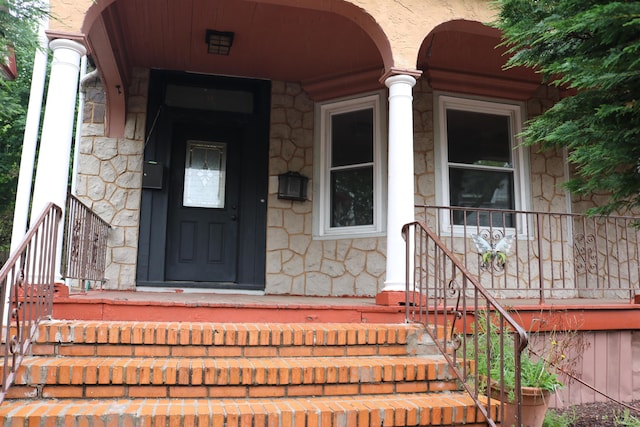 94 Lembeck Ave, Jersey City, NJ 07305 - view of exterior entry featuring stone siding