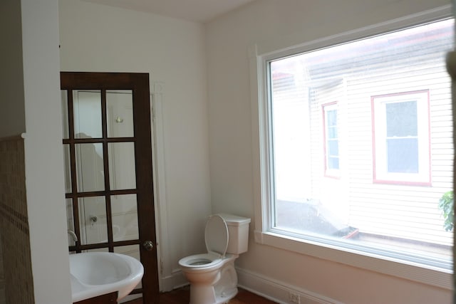 94 Lembeck Ave, Jersey City, NJ 07305 - half bathroom featuring toilet and a sink