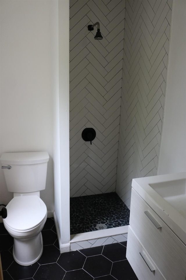 94 Lembeck Ave, Jersey City, NJ 07305 - bathroom with a stall shower, vanity, and tile patterned flooring