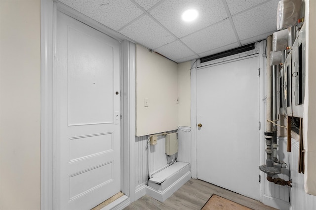 337 70th St, Guttenberg, NJ 07093 - finished basement featuring light wood-type flooring and a drop ceiling