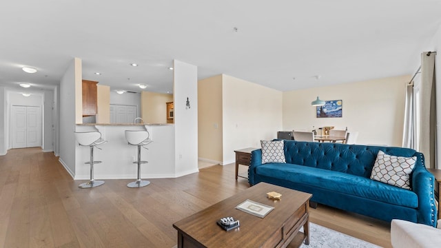 344 The Promenade Unit 344, Edgewater, NJ 07020 - living room featuring baseboards, recessed lighting, and hardwood / wood-style floors