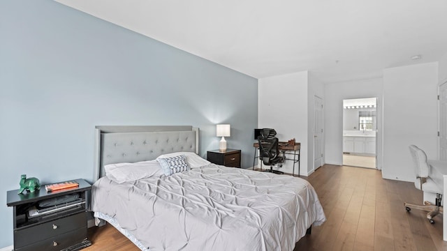 344 The Promenade Unit 344, Edgewater, NJ 07020 - bedroom featuring connected bathroom and wood finished floors