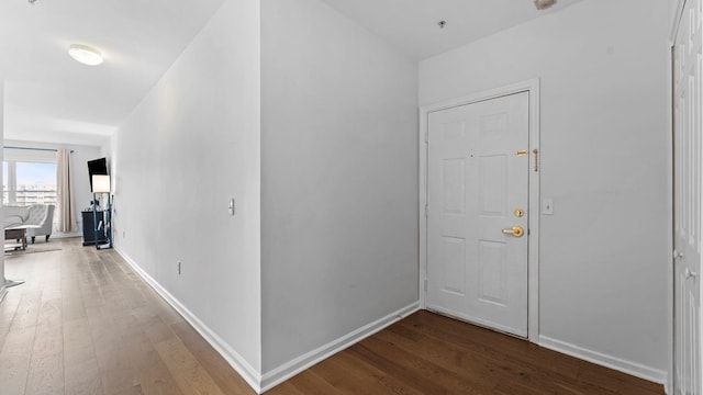 344 The Promenade Unit 344, Edgewater, NJ 07020 - hallway with baseboards and wood finished floors