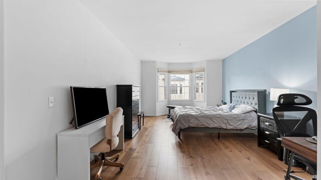 344 The Promenade Unit 344, Edgewater, NJ 07020 - bedroom with light wood-style flooring