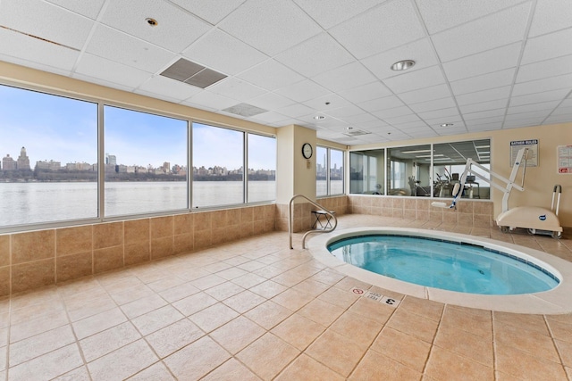 344 The Promenade Unit 344, Edgewater, NJ 07020 - view of swimming pool featuring a water view and an indoor in ground hot tub