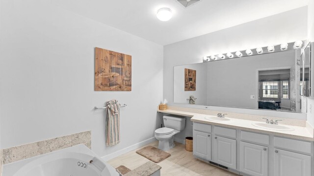 344 The Promenade Unit 344, Edgewater, NJ 07020 - full bathroom featuring a whirlpool tub, a sink, double vanity, and toilet