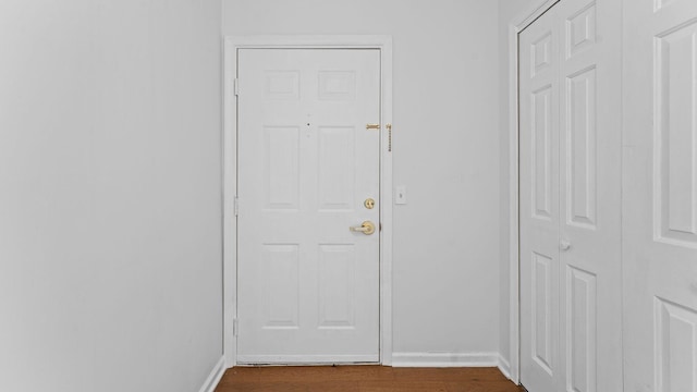 344 The Promenade Unit 344, Edgewater, NJ 07020 - entryway featuring baseboards and dark wood-type flooring