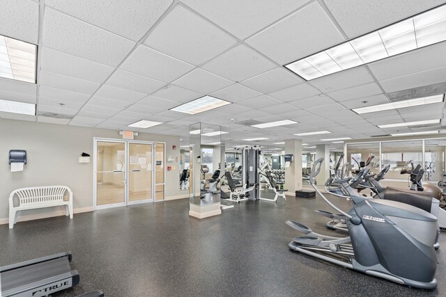 344 The Promenade Unit 344, Edgewater, NJ 07020 - exercise room featuring baseboards and a drop ceiling